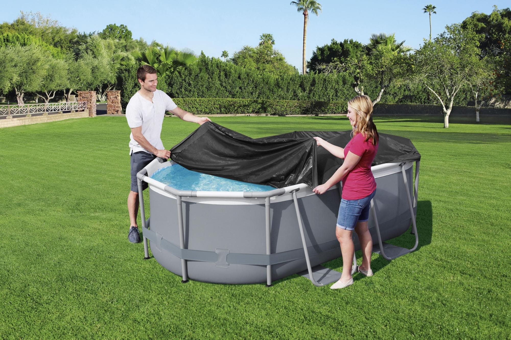 Coperture e Tappetini Copertura ovale per piscina da 300x200x84 cm Bestway 1